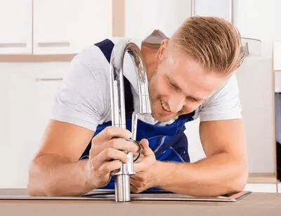 man with faucet